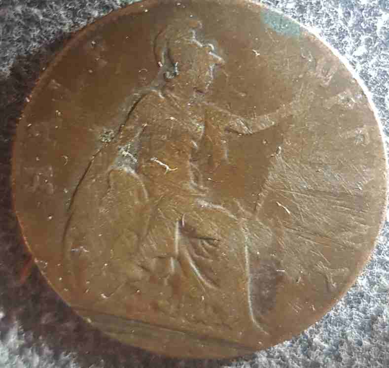 Half-Penny-Strike-Error-Or-Just-A-Old-Damaged-Coin
